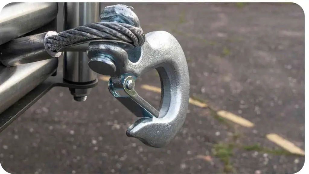 a close up of a metal hook on the side of a truck
